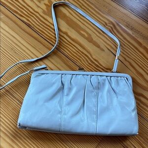 Vintage style Elegant gray clutch with strap.